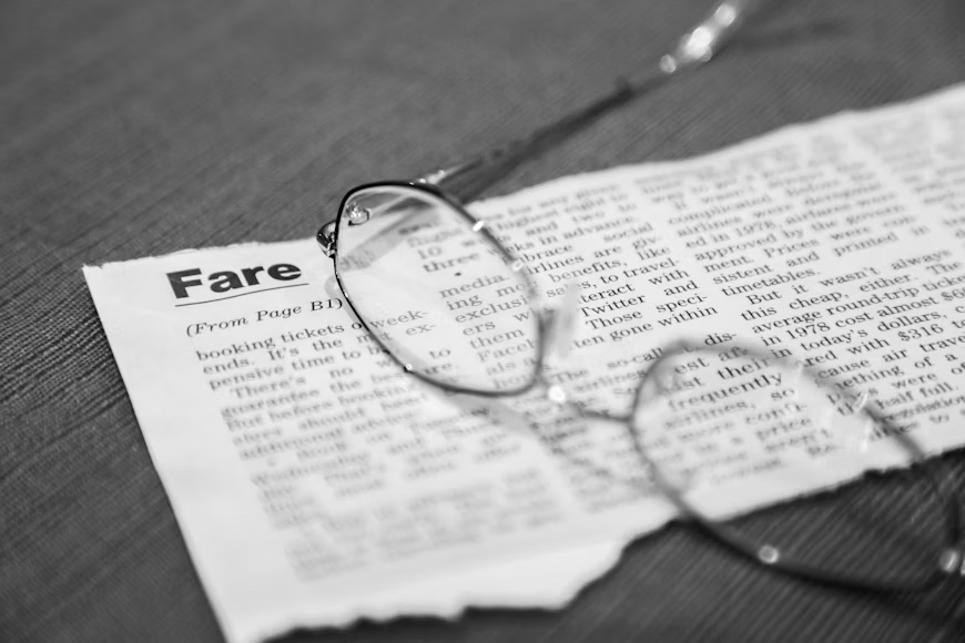 Fact-checking concept showing documents and online sources being reviewed for accuracy.